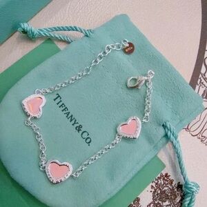 Tiffany & Co. Sterling Silver Bracelet with Pink Heart Charms